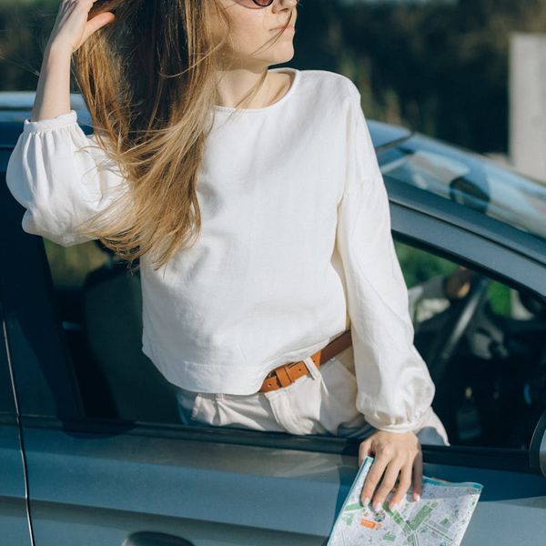 Person feeling energized and happy outdoors under the sun.